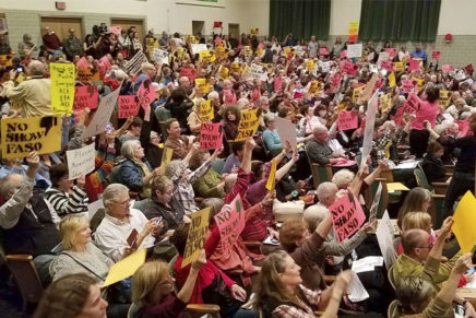 Faso conspicuous by his absence at packed town hall in Kingston