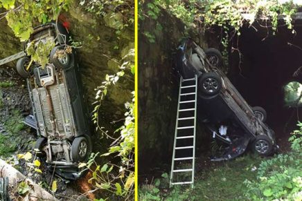 Car leaves Kingston street, plunges to rail bed below; 90-year-old driver hospitalized