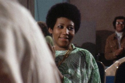 Aretha Franklin on screen in Amazing Grace in Woodstock